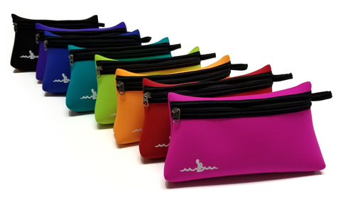 Neoprene Beach Pouches in all colors, listed from front to back: pink, red, mango, key lime green, turquoise, blue, purple, and blue.