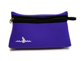 Purple Neoprene Beach Pouch with a black zipper and a black finger loop on the right side of the zipper. The Warm Belly Wetsuit logo is printed in white in the bottom left corner.