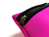 Close-up of pink Neoprene Beach Pouch showcasing the black YKK zipper